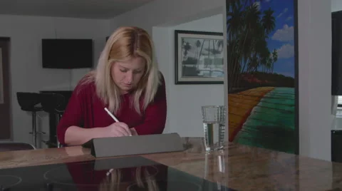 Female Drawing with Pencil on iPad Pro Wide Shot in Home Vídeos de archivo 59731512