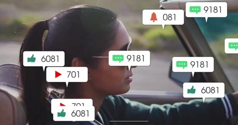 Female driver driving in car interior, with floating social media marketing Stock Footage 329424131