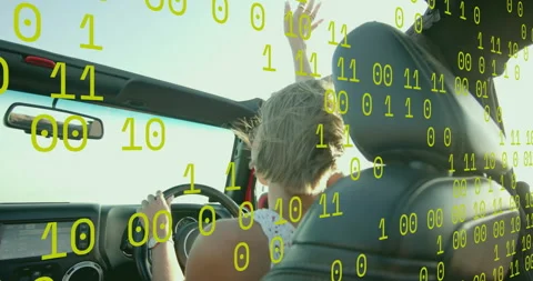 Female driver speeding car lifting arm feeling breeze while green binary overlay Stock Footage 314845160