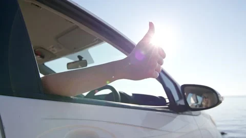 Female driver thumbs up. Stock Footage 221706476