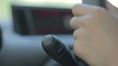 Female driver using turn signal switch Stock Footage 66882850