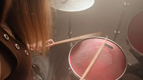 Female Drummer Playing Snare Drum with Drumsticks in Music Studio Stock Footage 338403359