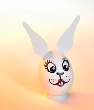 Female easter bunny egg Stock Photos