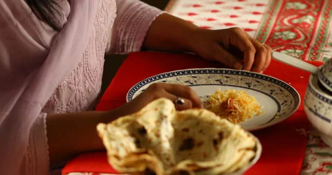 Female Eating on dining table Stock Footage 288646214