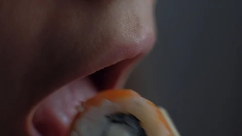 Female eating rolls Stock Footage 85897518