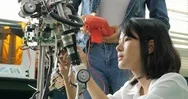 Female Electronics Engineer Building, Testing, Fixing Robotics In Laboratory. Stock Footage