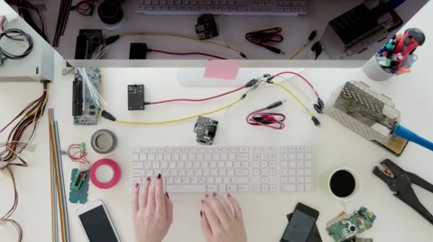 Female electronics engineer working on a computer Stock Footage 63914460