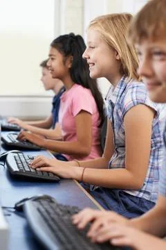 Female Elementary Pupil In Computer Class Stock Photos