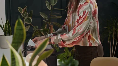 Female Employee Copying Documents on Printer in Office with Green Plants Video stock 302894193
