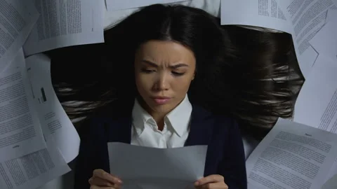 Female employee crumpling document with anger, hating work, job burnout concept Stock Footage 109637680