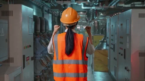 Female Engineer Celebrating While Working In Engine Control Room Stock Footage 292368875