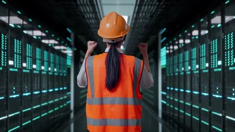 Female Engineer Celebrating While Working in Data Center Stock Footage 321994016