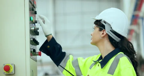 Female Engineer  checking machine at factory. Stock Footage 249987908