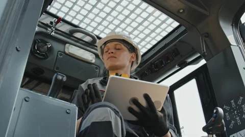 Female Engineer Checking Tractor Cab Video stock 222737087