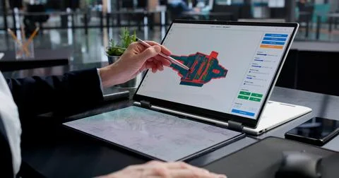 Female Engineer Developing 3D CAD Model Of Laptop Screen 写真素材