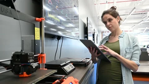 Female engineer with digital tablet working in office Stock Footage 220346198