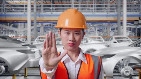 Female Engineer Disapproving With No Hand Sign In Car Factory Stock Footage 331632305
