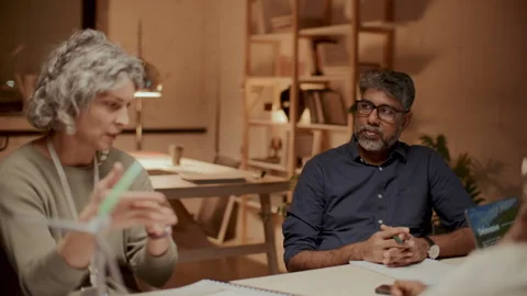 Female Engineer Explaining Renewable Energy Concepts to Business Team Stock Footage 300256902