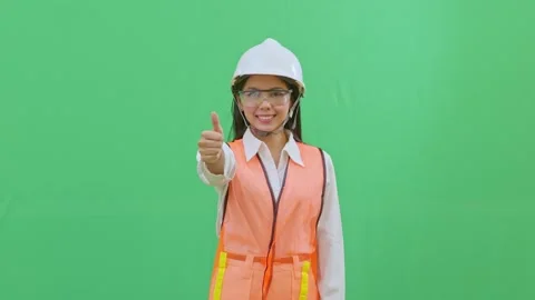 Female Engineer Giving Thumbs Up Safety Approval Green Screen 스톡 동영상 331970663