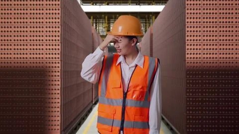 Female Engineer Having A Headache While Working With Brick In Stacks Stock Footage 303761709