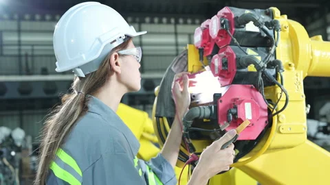 A female engineer inspects the electrical system Stock Footage 241102205