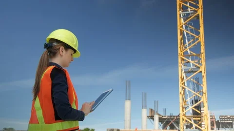Female Engineer Inspects Site Using tablet, 4k Stock Footage 109465095