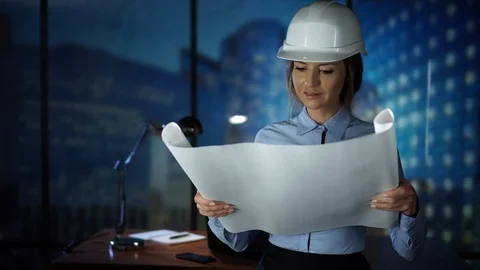 Female Engineer Looking at the Project, Engineer on a construction, Builder Stock Footage 95300795