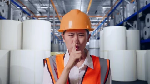 Female Engineer Making Shh Gesture at Polymer Plant Stock Footage 334531805