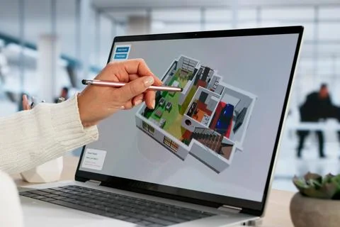 Female Engineer Mapping Wireless Signal Strength In Smart Home Model Foto stock
