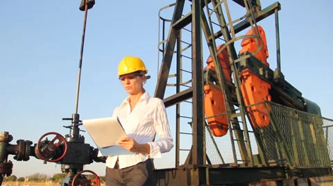 Female Engineer in an Oilfield Stock Footage 34637772