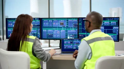 Female Engineer Operates SCADA System Stock Footage 330248995