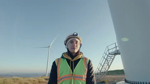 Female Engineer Posing on Camera at Wind Farm Stock Footage 237241586