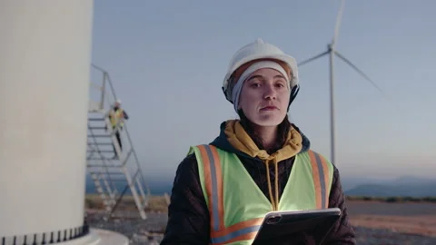 Female Engineer Posing with Digital Tablet on Wind Farm Stock Footage 237242617