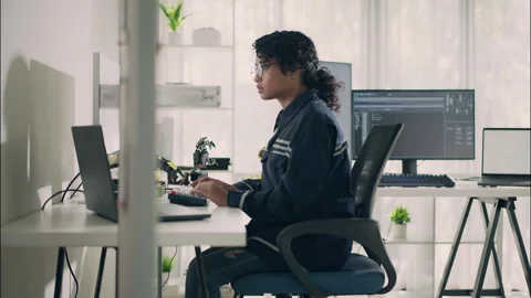 Female engineer programming artificial intelligence on computer. Stock Footage 319001481