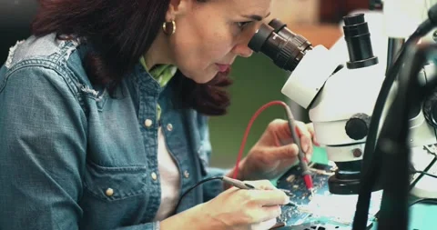 Female engineer quality inspector is checking the item Stock Footage 153462071