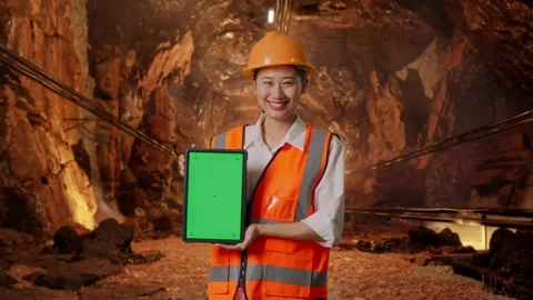 Female Engineer Showing Green Screen Tablet In Mine Tunnel Stock Footage 299574338
