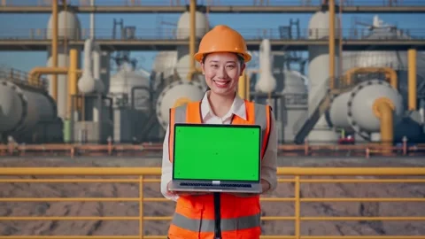 Female Engineer Showing Green Screen Laptop at Energy Plant Stock Footage 331139174