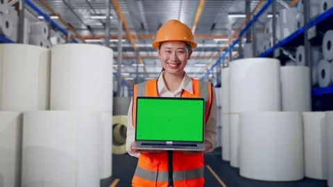 Female Engineer Showing Green Screen Laptop at Polymer Plant Stock Footage 334530553