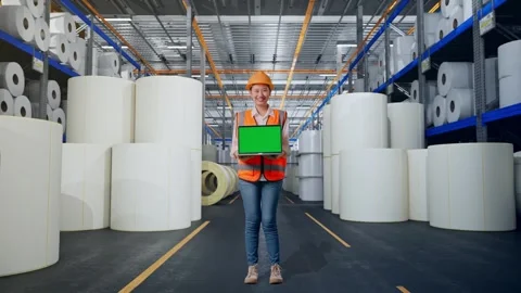 Female Engineer Showing Green Screen Laptop at Polymer Plant Stock Footage 334533440