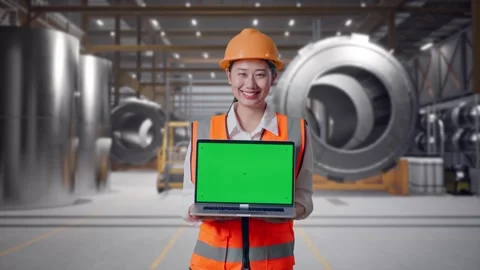 Female Engineer Showing Green Screen Laptop at Heavy Factory Stock Footage 340823692