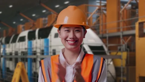 Female Engineer Smiling And Clapping Her Hands, Train Service Video stock 314564693