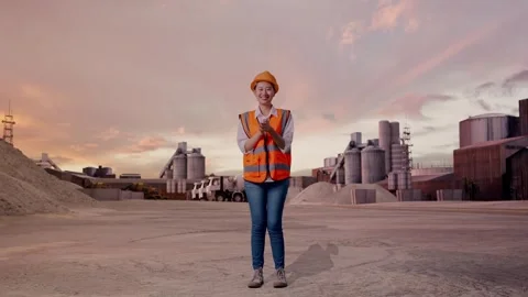 Female Engineer Smiling And Clapping Her... | Stock Video | Pond5