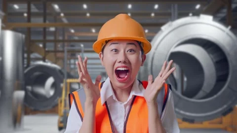 Female Engineer Smiling And Saying Wow at Heavy Factory 動画素材 340824736