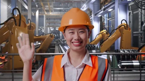 Female Engineer Smiling And Waving Hand Saying Bye With Robotic Arms Stock Footage 301417448