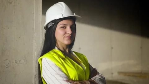 Female engineer smiling at construction site. Self-confident Stock Footage 240336469