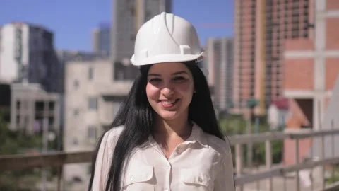 Female engineer smiling at construction site. Self-confident Video stock 240339374
