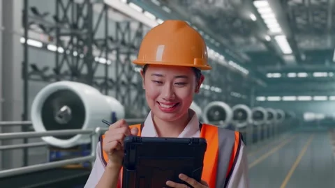Female Engineer Taking Note On The Tablet, Aircraft Engine Factory Video stock 314608525