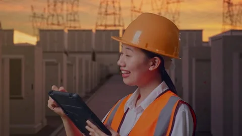 Female Engineer Taking Note On The Tablet with High Voltage Power 스톡 동영상 331286252