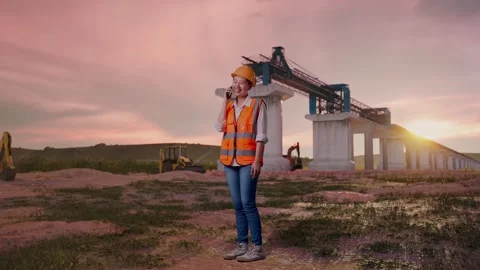 Female Engineer Talking On Smartphone at Construction Site Stock Footage 330333821