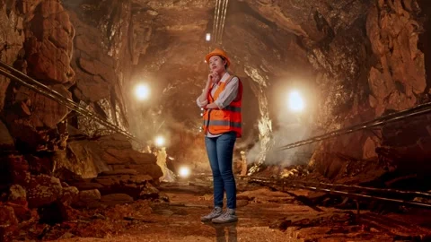 Female Engineer Thinking About Something In Mine Tunnel Stock Footage 299580133